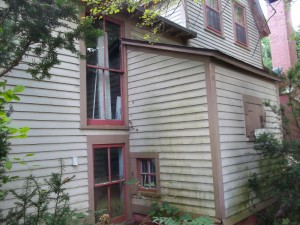 Peeling paint on wood siding